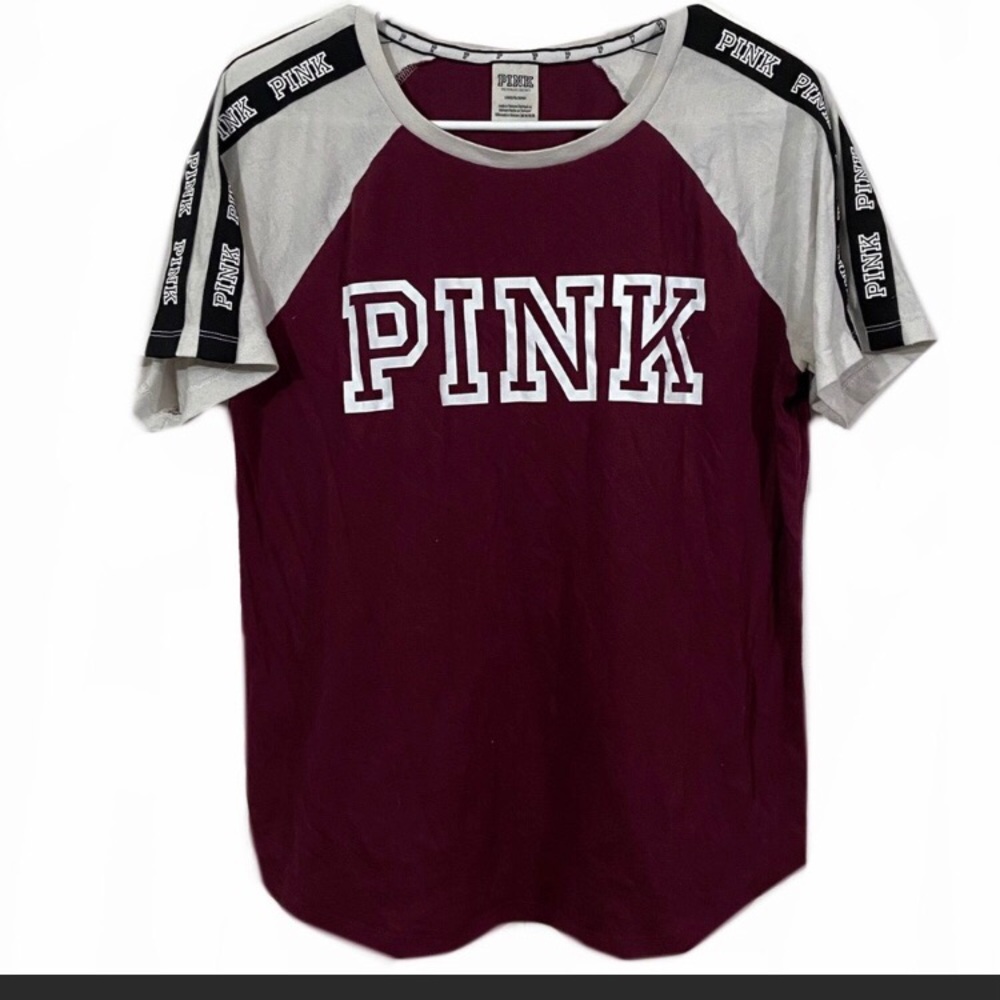 Pink Victoria’s Secret size large shirt.
